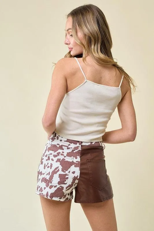 SANDY TWO TONE COW PRINT SHORTS WITH PU CONTRAST